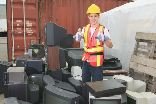 Protective equipment and documentation used by an insured waste removal company during a mid-job safety check